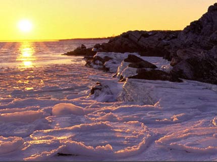 Maine's coastline at sunset during the winter